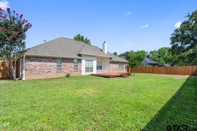 a house view with a garden space