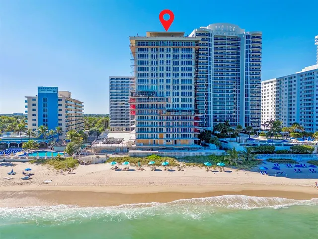 a view of city with tall buildings