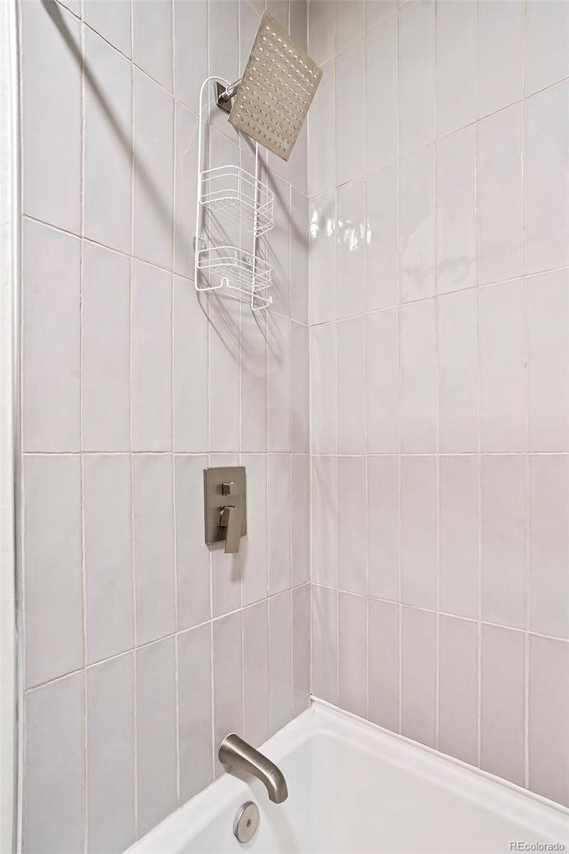 701 Galapago Street Denver, CO 80204 - Photo 11 of 38 a bathroom with a shower