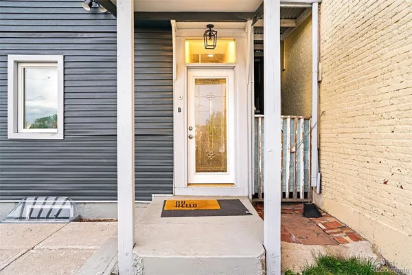 a kitchen with stainless steel appliances a refrigerator and a stove top oven