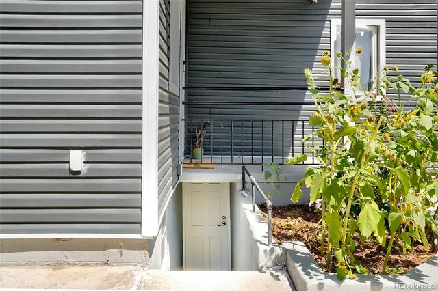 a bedroom with a bed and cabinets