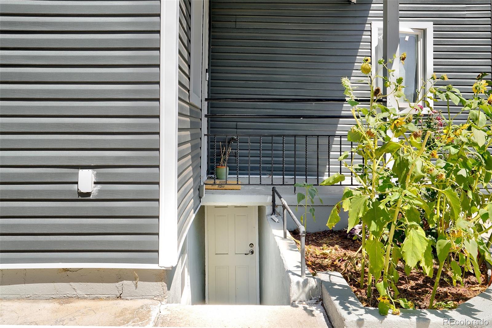 701 Galapago Street Denver, CO 80204 - Photo 27 of 38 a view of a house with a door