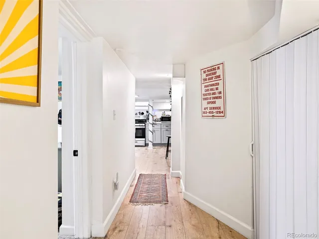 a bedroom with a bed and a closet