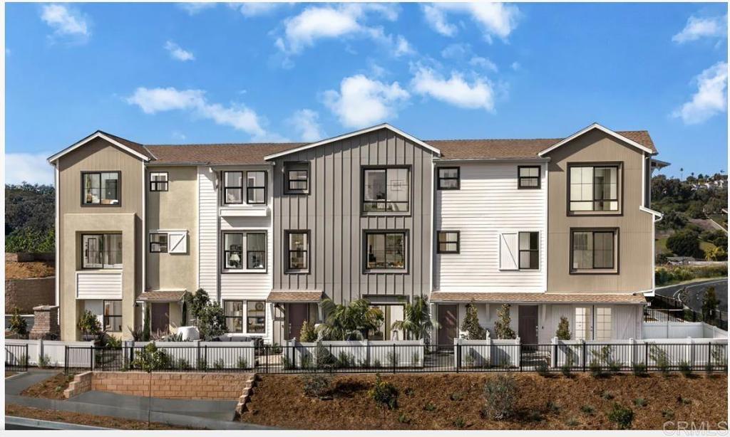 2535 Chamomile Lane Carlsbad, CA 92008 - Photo 13 of 15 a front view of a house with a yard