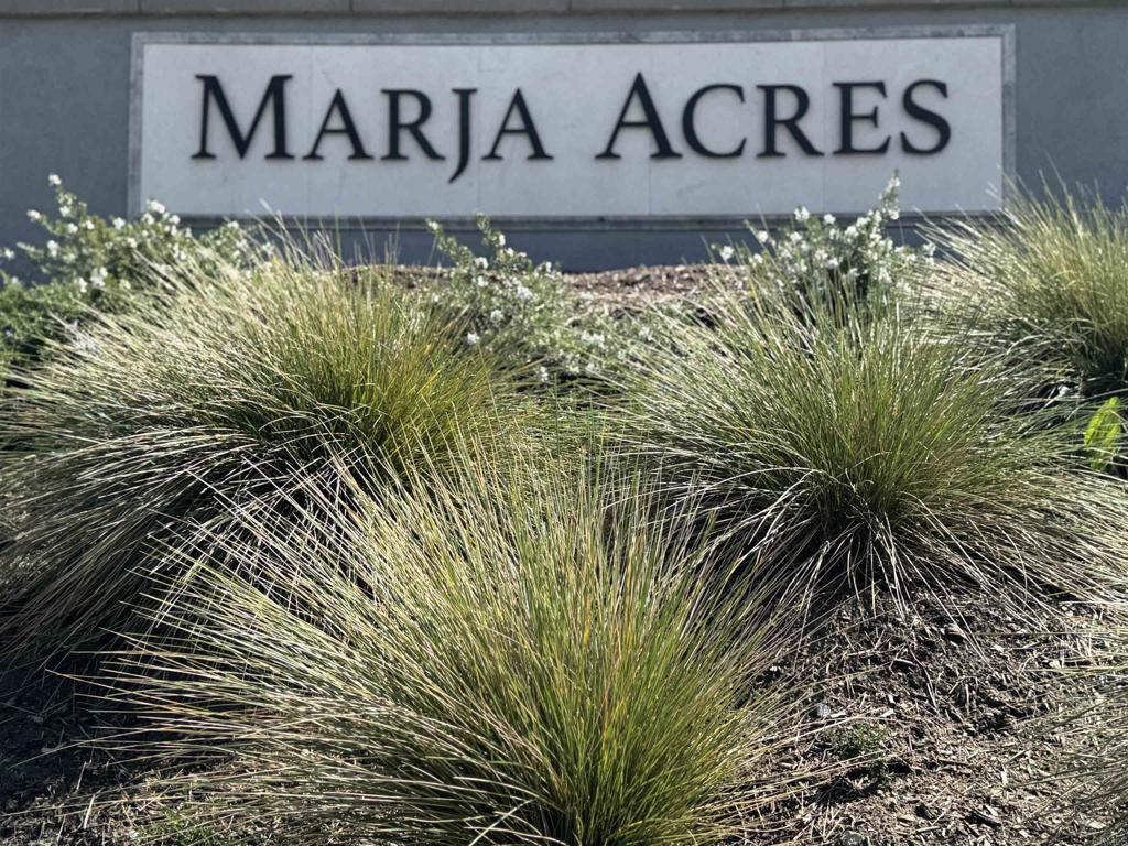 2535 Chamomile Lane Carlsbad, CA 92008 - Photo 10 of 15 a sign that is on a brick wall