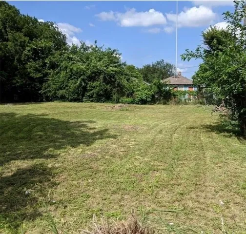 a view of a yard with an outdoor space