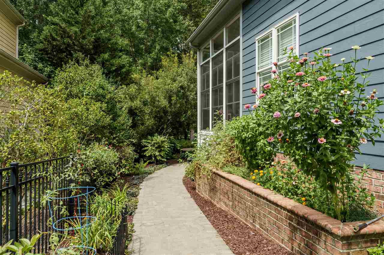 8119 Dreamy Way Raleigh, NC 27613 - Photo 28 of 30 Raised beds for organic vegetable/herb garden on side of house. Side Yard