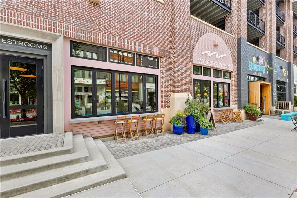 255 High Street Fayetteville, GA 30214 - Photo 50 of 67 a view of brick building with a outdoor seating space