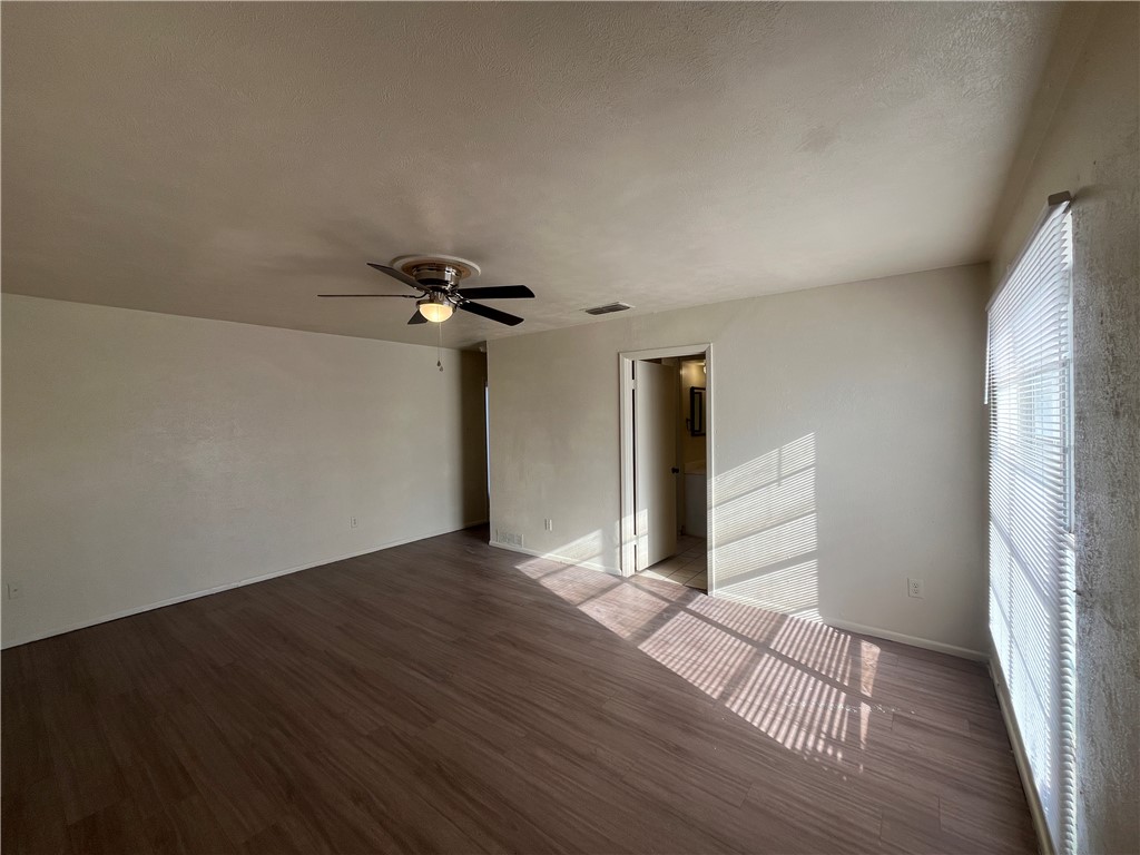 5002 Wingfoot Lane, Unit A Corpus Christi, TX 78413 - Photo 11 of 25 a view of a livingroom with wooden floor