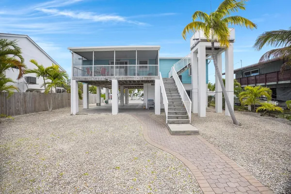a house with trees in front of it