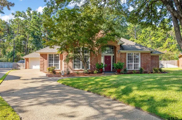 front view of a house with a patio