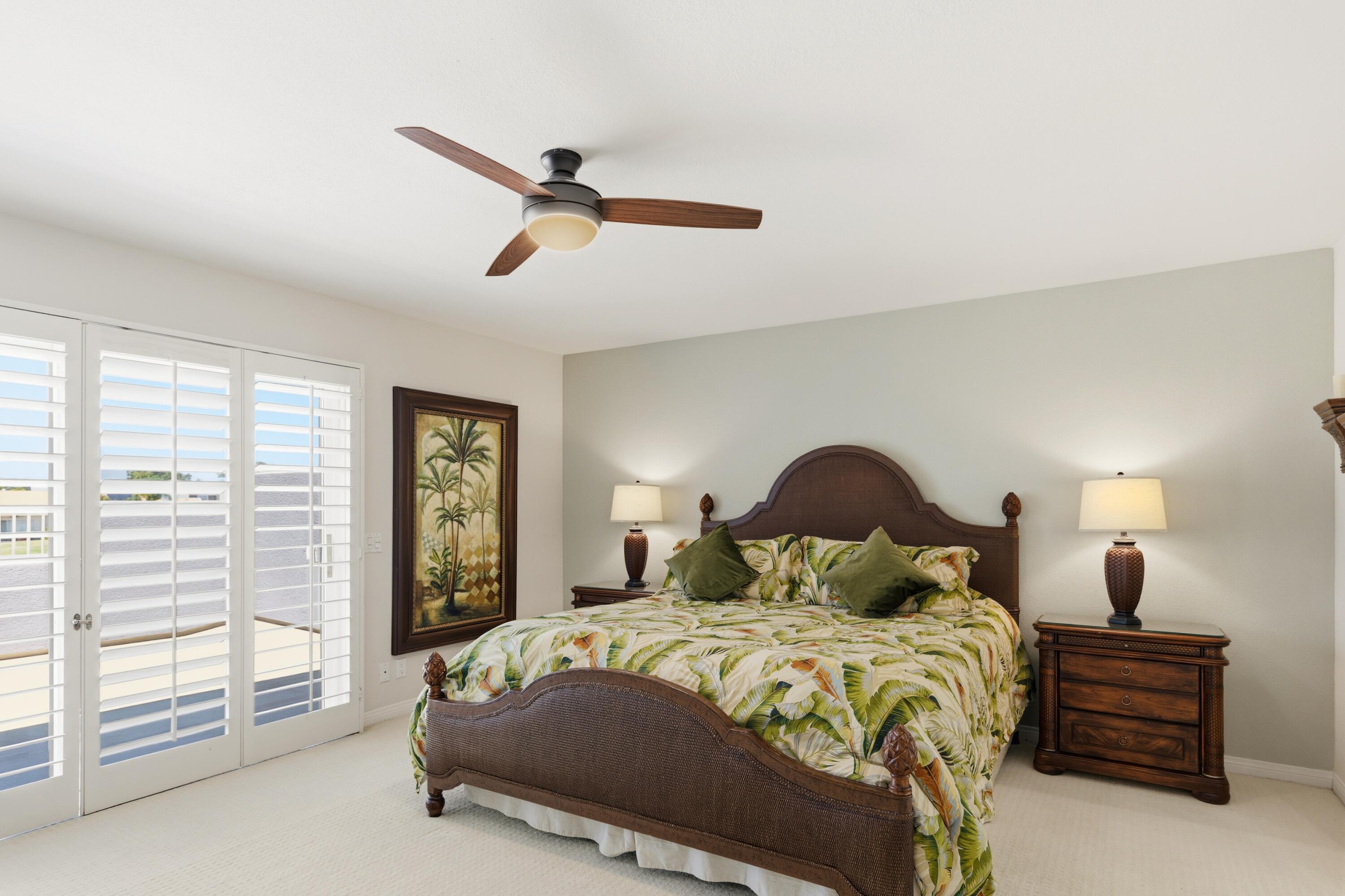 39 Augusta Drive Rancho Mirage, CA 92270 - Photo 34 of 53 a bedroom with a large bed and a window