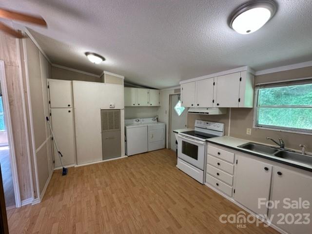 143 Hubert McCall Drive Balsam Grove, NC 28708 - Photo 8 of 19 a kitchen with stainless steel appliances granite countertop a refrigerator and a stove top oven