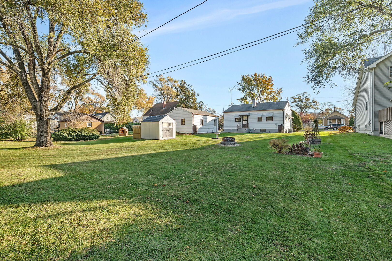 711 Clinton Street Lockport, IL 60441 - Photo 18 of 22 a view of a house with a big yard