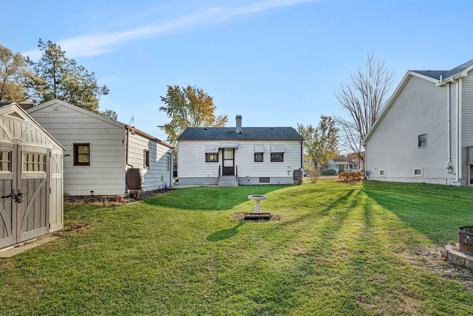 711 Clinton Street Lockport, IL 60441 - Photo 20 of 22 a front view of a house with a yard