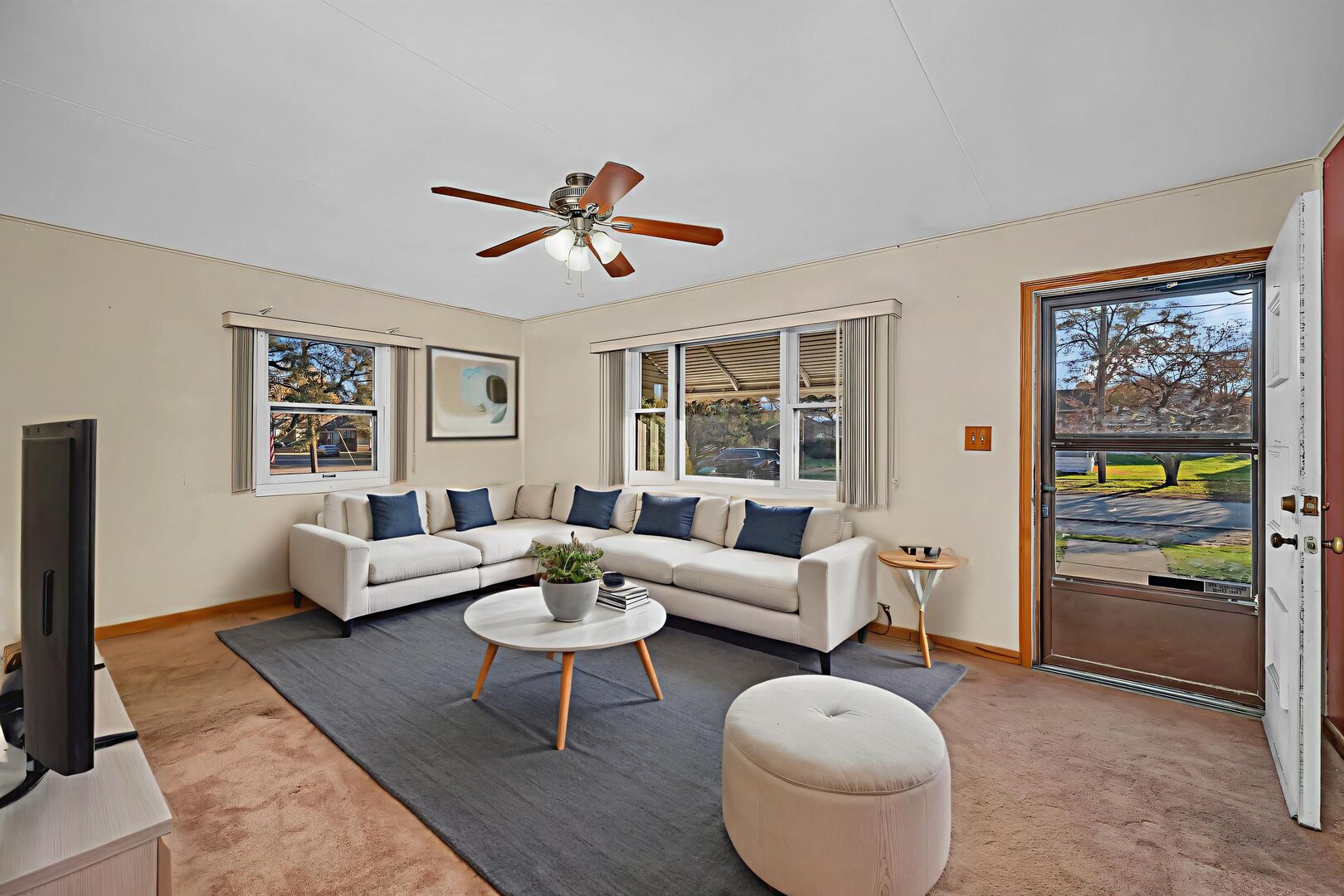 711 Clinton Street Lockport, IL 60441 - Photo 3 of 22 a living room with furniture and a flat screen tv