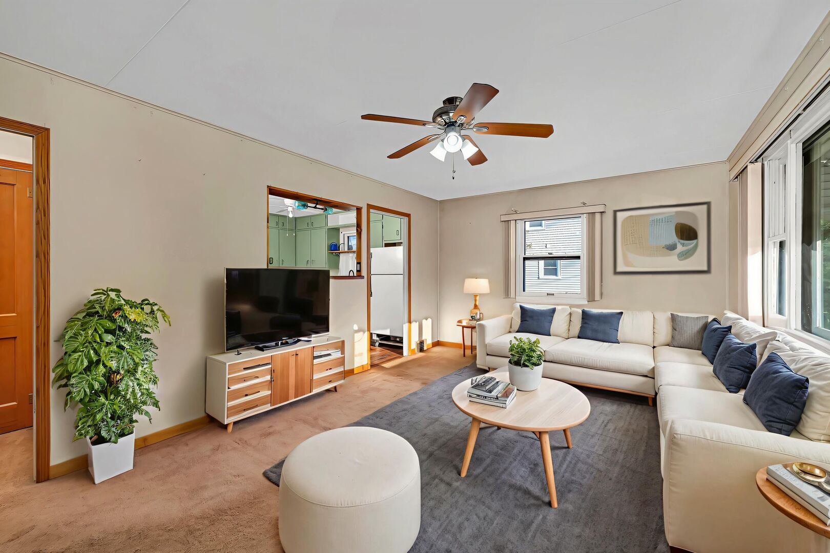 711 Clinton Street Lockport, IL 60441 - Photo 4 of 22 a living room with furniture and a flat screen tv