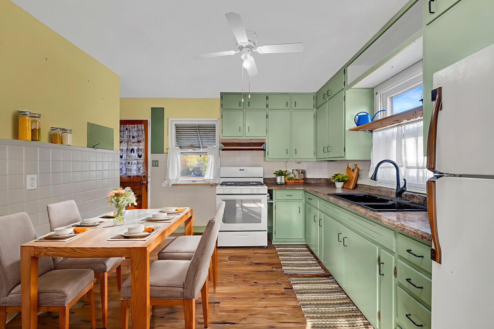 711 Clinton Street Lockport, IL 60441 - Photo 5 of 22 a kitchen with stainless steel appliances granite countertop a sink stove and refrigerator