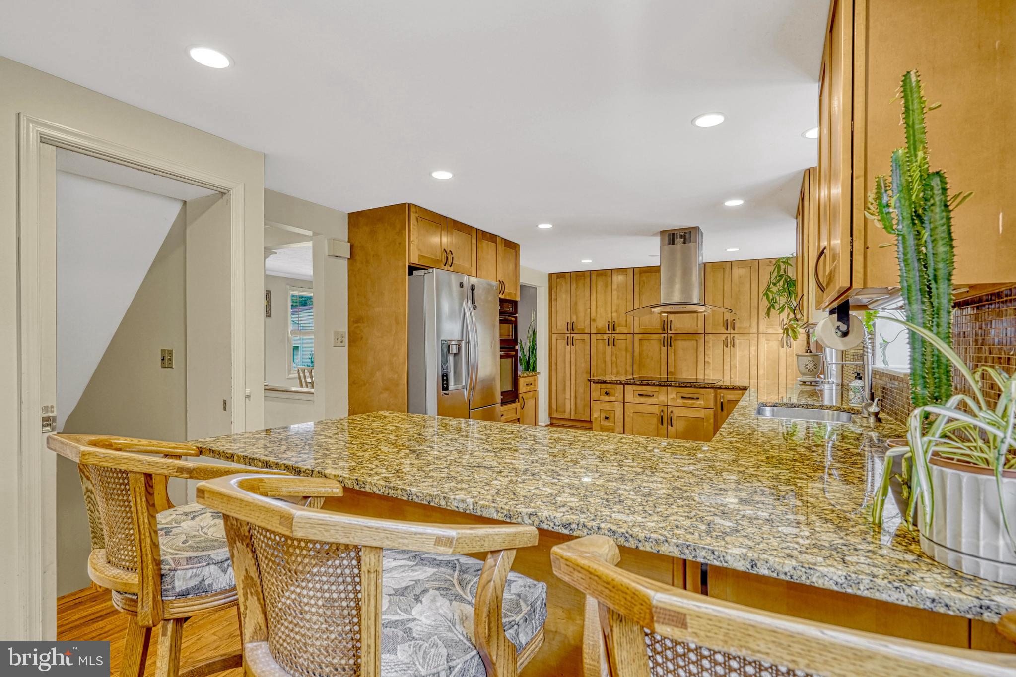 16083 Radburn Street Woodbridge, VA 22191 - Photo 13 of 63 Space for Bar Stools on Kitchen Peninsula