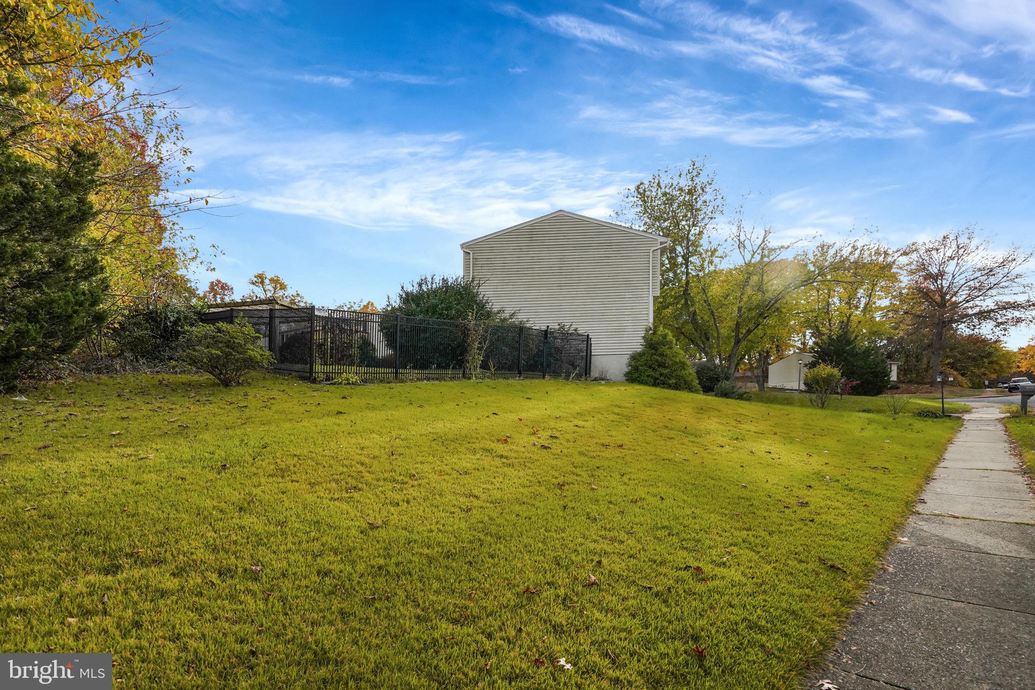 16083 Radburn Street Woodbridge, VA 22191 - Photo 54 of 63 Side Yard View from Sidewalk