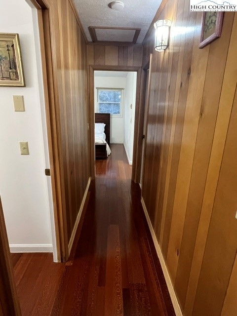 114 Lady Slipper Loop Newland, NC 28657 - Photo 19 of 50 a view of a hallway with wooden floor