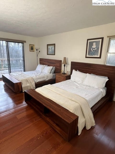 114 Lady Slipper Loop Newland, NC 28657 - Photo 20 of 50 a bedroom with bed and window