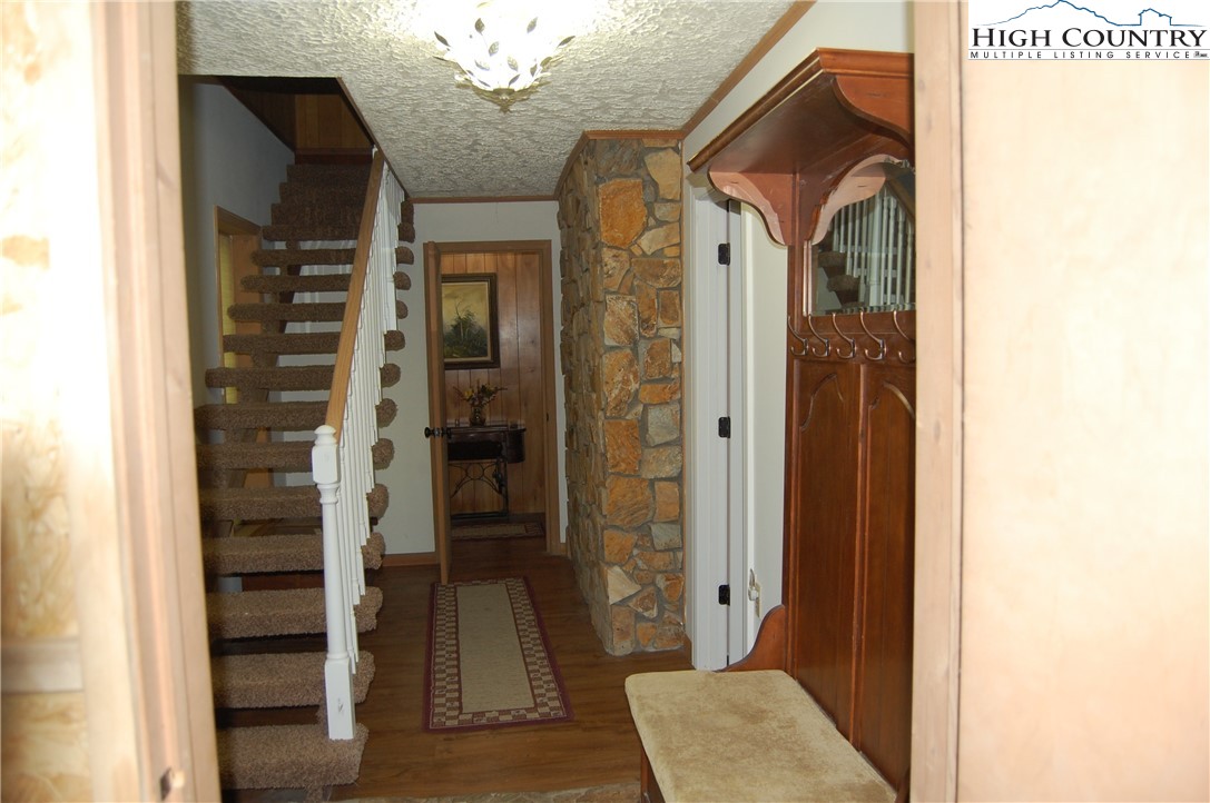 114 Lady Slipper Loop Newland, NC 28657 - Photo 27 of 50 a view of hallway with walk in closet and bathroom