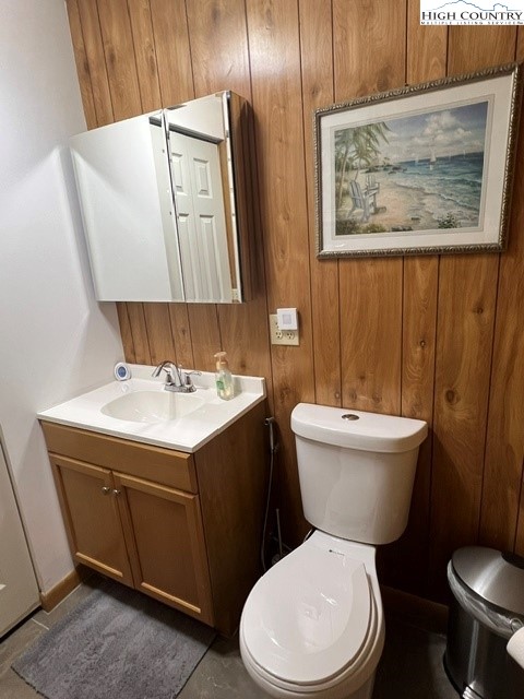 114 Lady Slipper Loop Newland, NC 28657 - Photo 39 of 50 a bathroom with a toilet sink and mirror