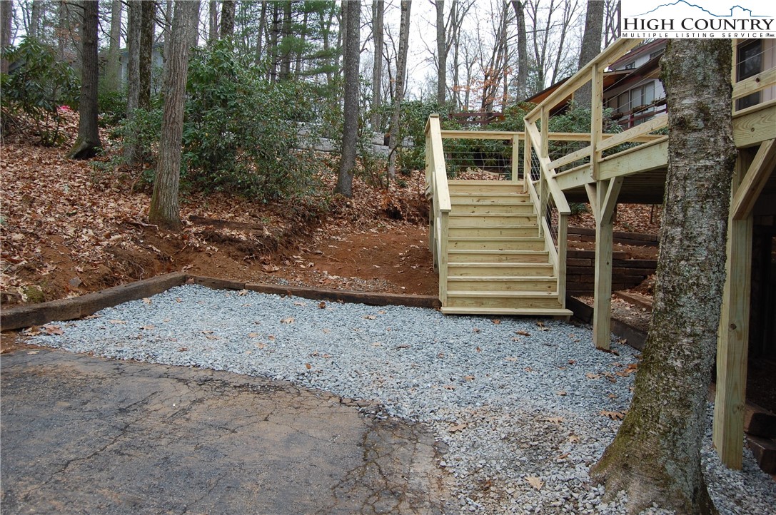 114 Lady Slipper Loop Newland, NC 28657 - Photo 4 of 50 a view of a house with a yard