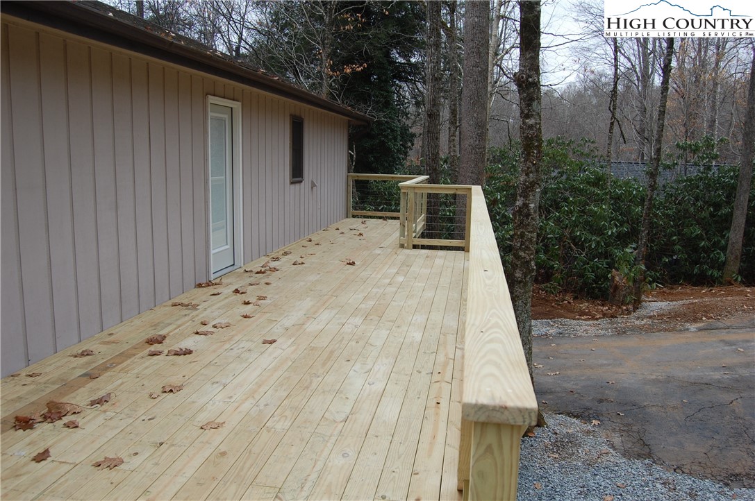 114 Lady Slipper Loop Newland, NC 28657 - Photo 6 of 50 a view of backyard with seating space