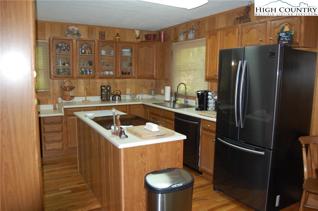 114 Lady Slipper Loop Newland, NC 28657 - Photo 10 of 50 a kitchen with a sink a stove and refrigerator
