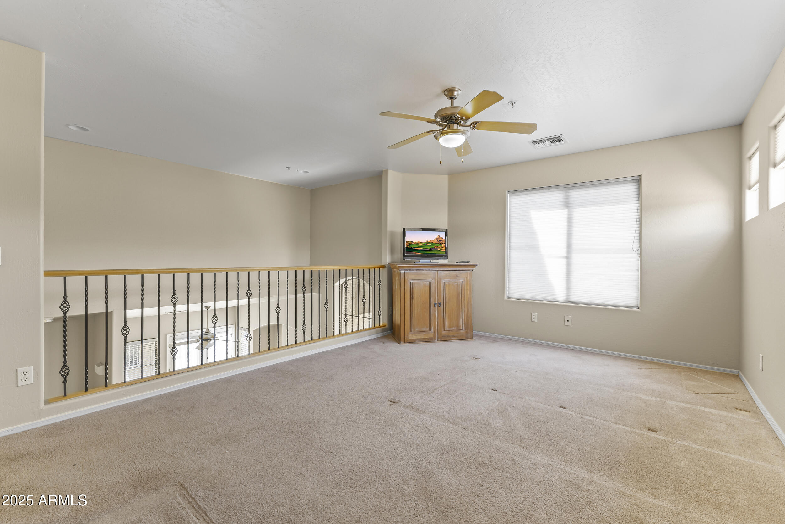 5415 East McKellips Road, Unit 100 Mesa, AZ 85215 - Photo 22 of 37 Upstairs Loft or Bedroom