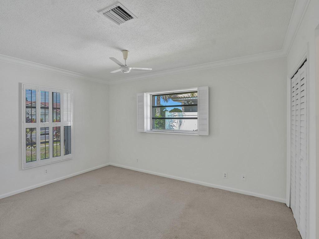 998 Southwest 5th Street Boca Raton, FL 33486 - Photo 22 of 55 an empty room with windows