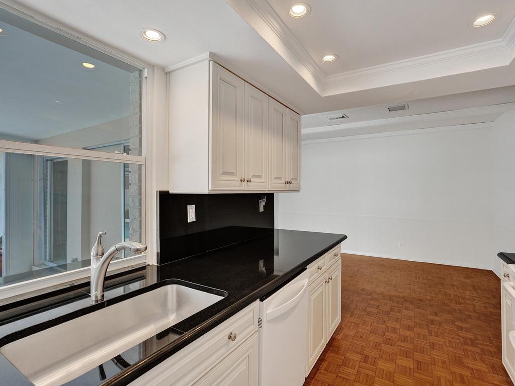 998 Southwest 5th Street Boca Raton, FL 33486 - Photo 28 of 55 a kitchen with a sink and cabinets