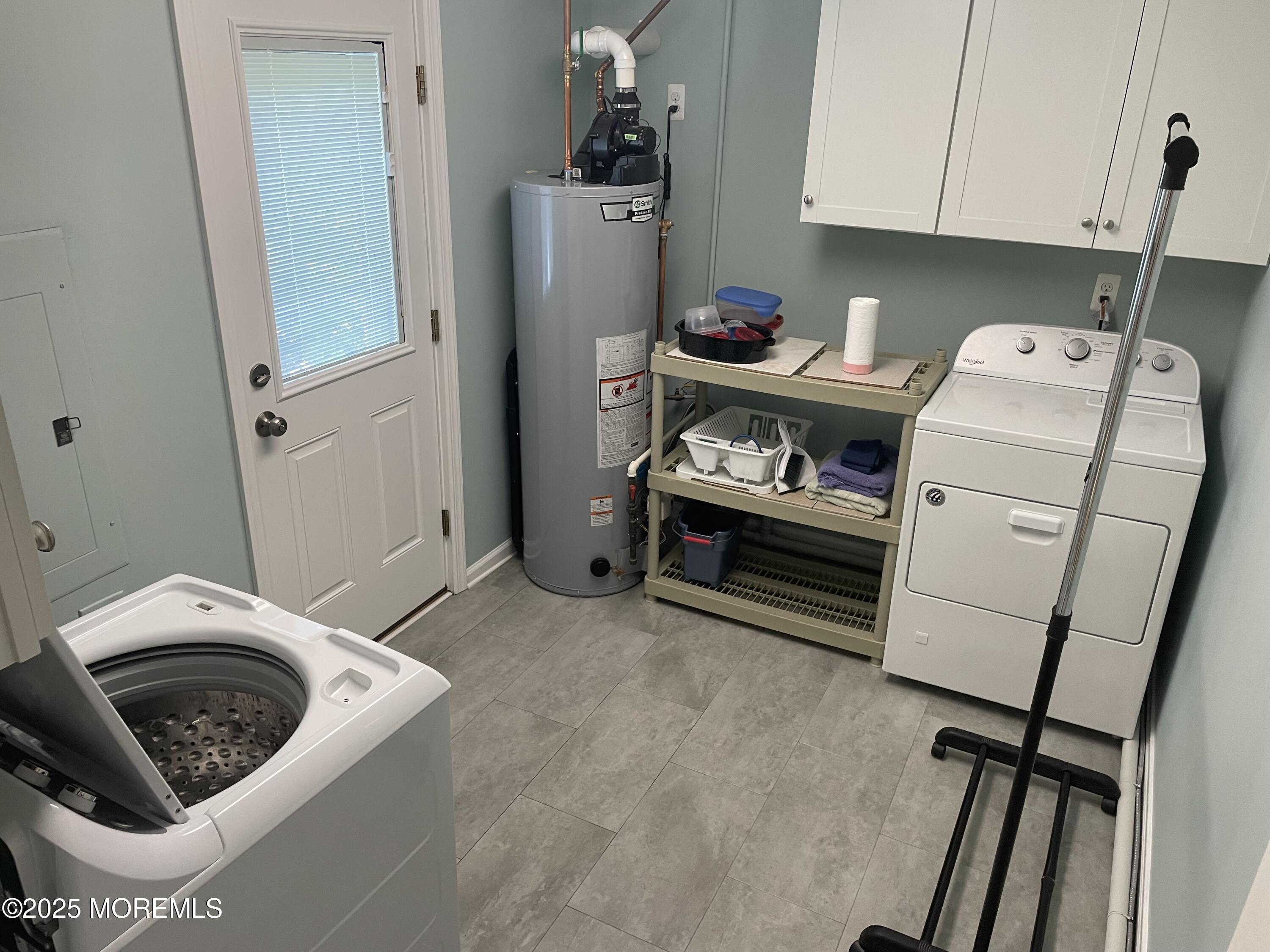 300 4th Avenue Spring Lake, NJ 07762 - Photo 15 of 40 a utility room with dryer and washer