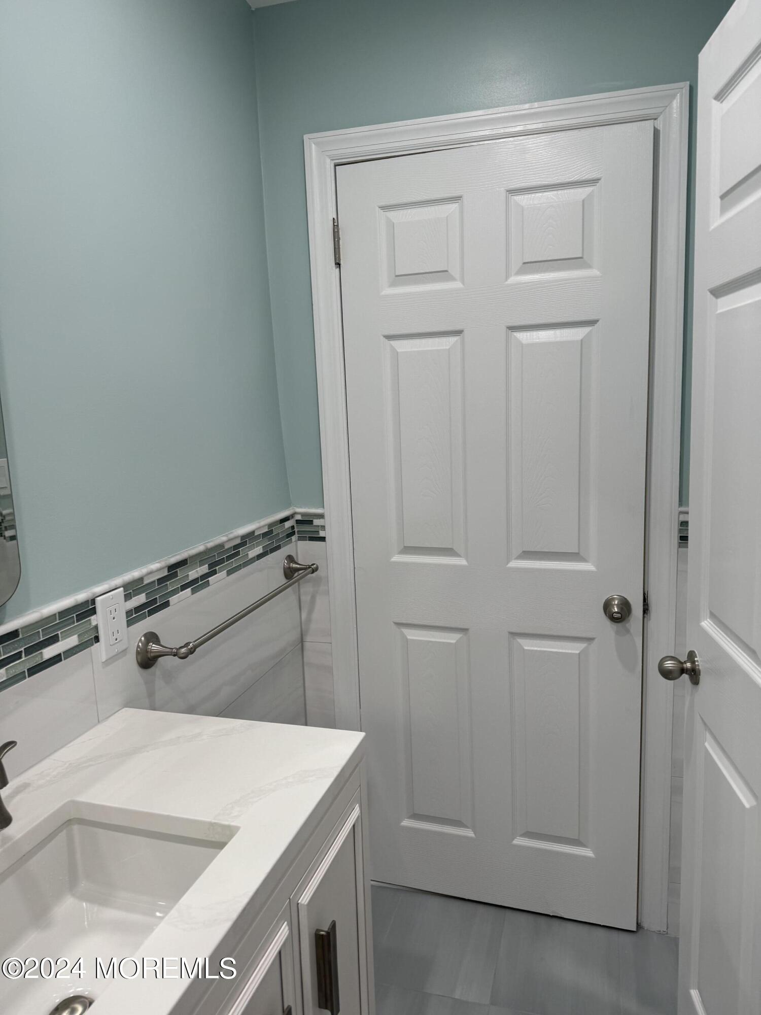 300 4th Avenue Spring Lake, NJ 07762 - Photo 18 of 40 a bathroom with a sink and vanity