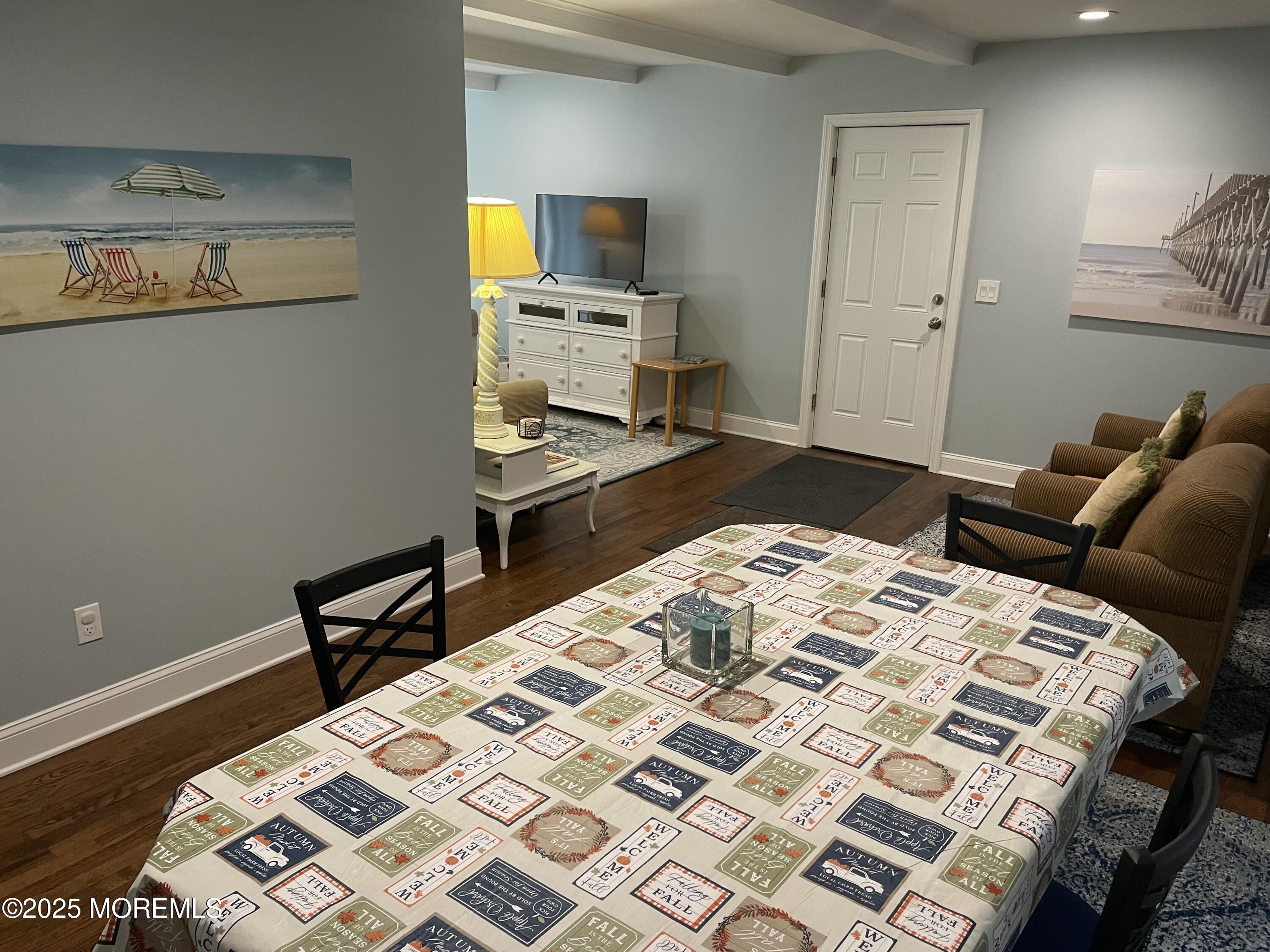 300 4th Avenue Spring Lake, NJ 07762 - Photo 21 of 40 a bedroom with a bed and wooden floor