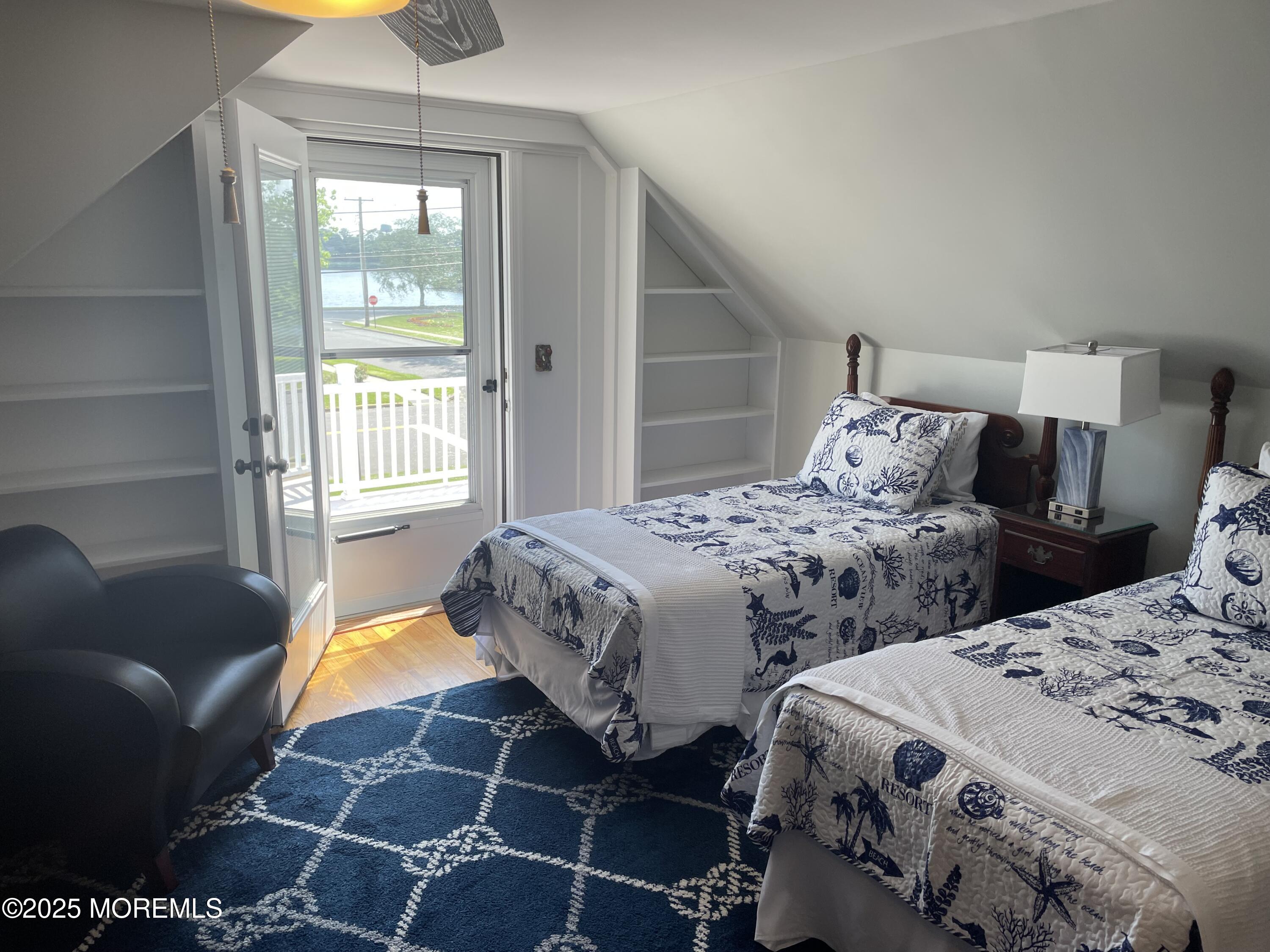 300 4th Avenue Spring Lake, NJ 07762 - Photo 27 of 40 a bedroom with two beds and a window