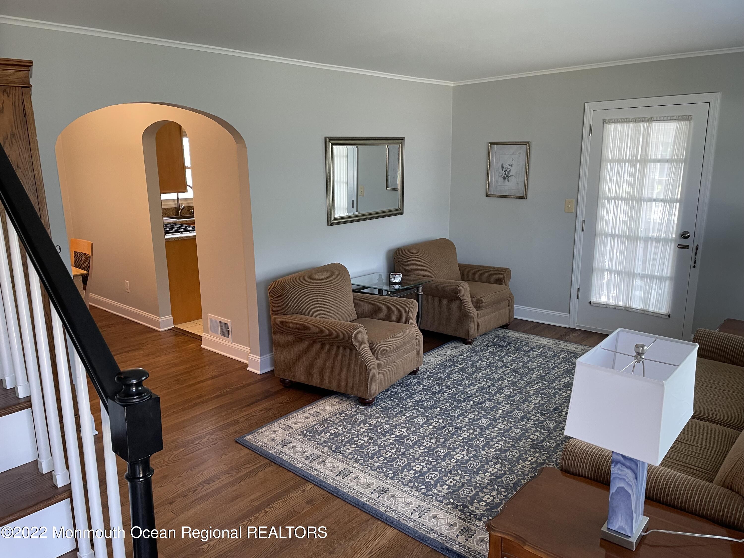 300 4th Avenue Spring Lake, NJ 07762 - Photo 7 of 40 a living room with furniture rug and window