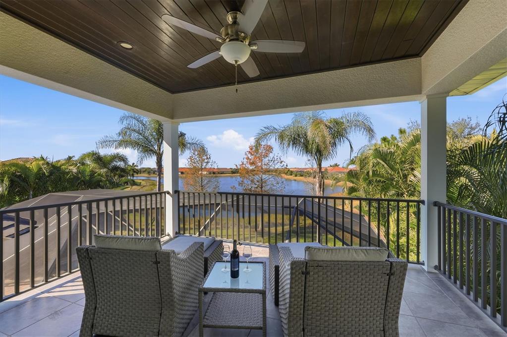 15909 Castle Park Terrace Lakewood Ranch, FL 34202 - Photo 33 of 66 a view of a balcony with furniture