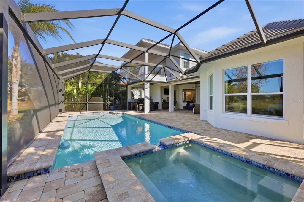 15909 Castle Park Terrace Lakewood Ranch, FL 34202 - Photo 39 of 66 a view of a house with a swimming pool
