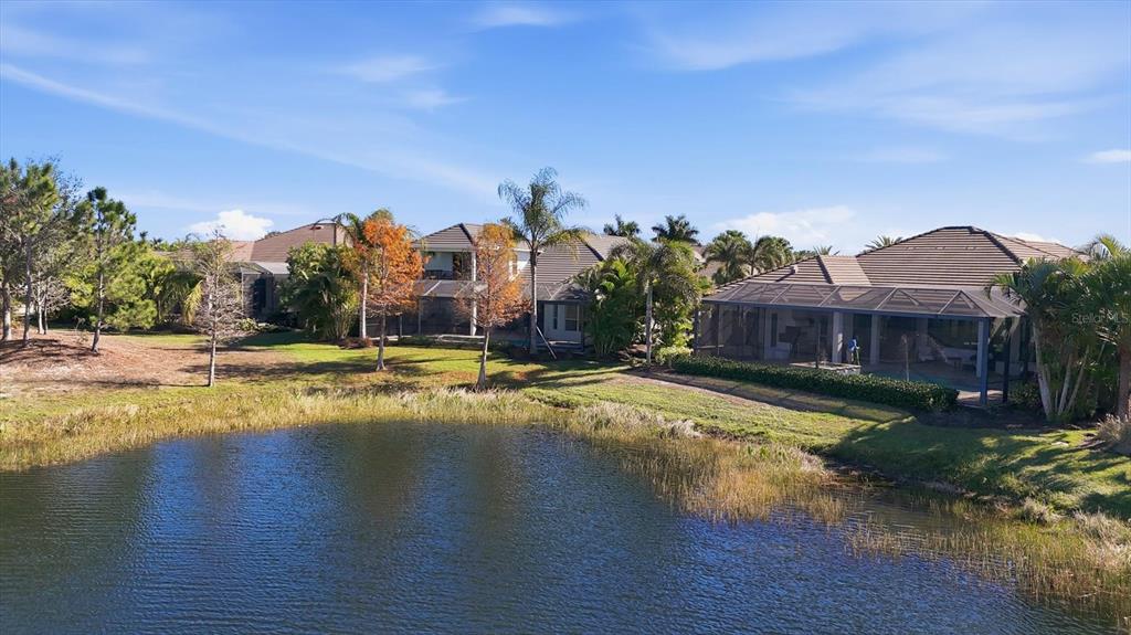 15909 Castle Park Terrace Lakewood Ranch, FL 34202 - Photo 45 of 66 a view of a swimming pool with an outdoor seating