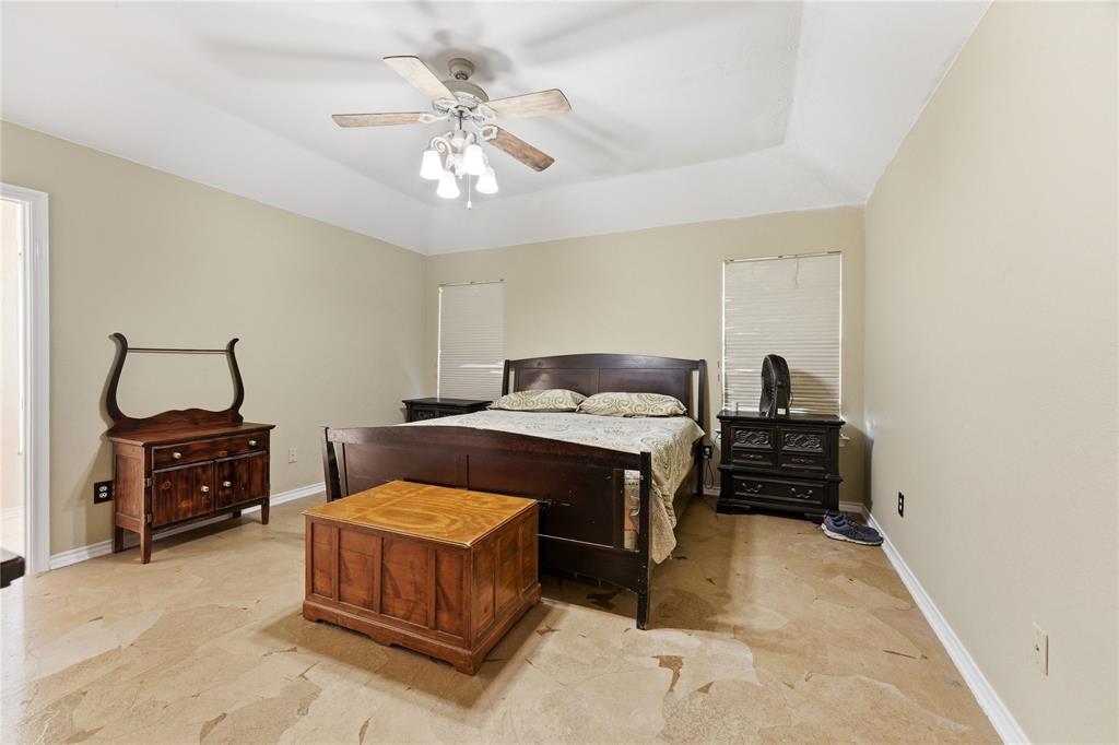 14529 County Road 511 Venus, TX 76084 - Photo 5 of 33 Bedroom with a raised ceiling and ceiling fan