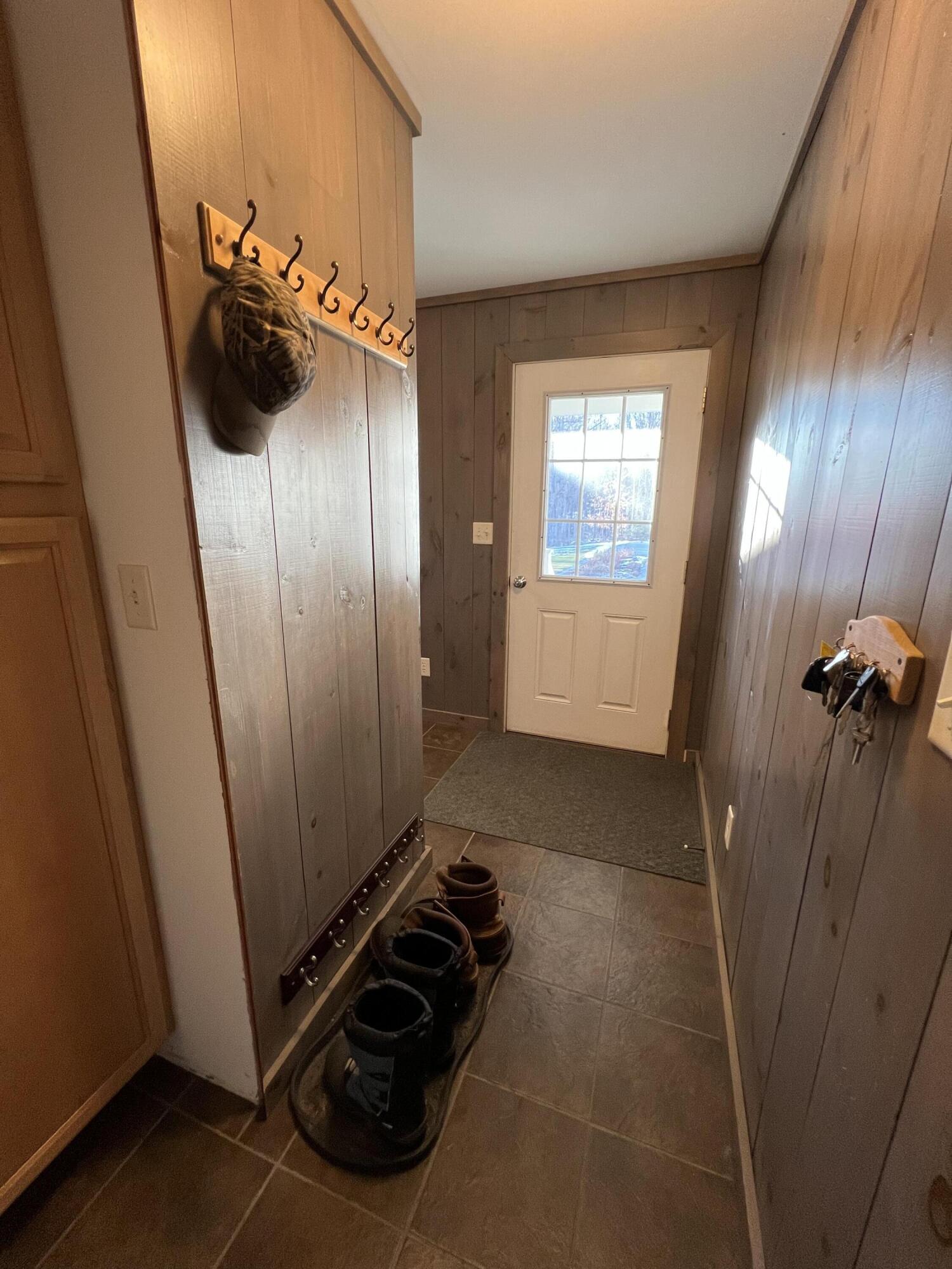 63 Walker Hill Road Jay, ME 04239 - Photo 52 of 76 Front entrance from laundry room.