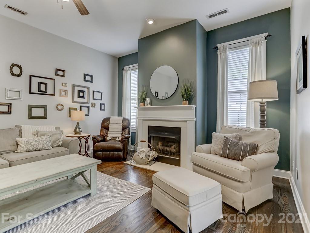 3035 Colonel Springs Way Fort Mill, SC 29708 - Photo 14 of 48 a living room with furniture and a fireplace