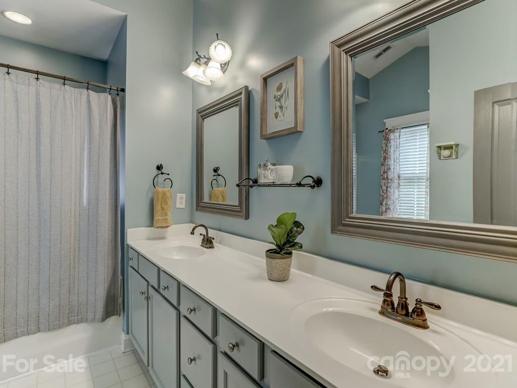 3035 Colonel Springs Way Fort Mill, SC 29708 - Photo 33 of 48 a bathroom with a sink double vanity and a mirror