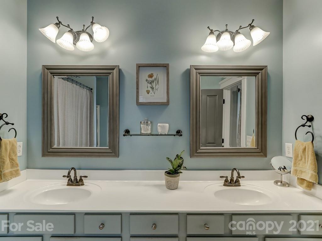 3035 Colonel Springs Way Fort Mill, SC 29708 - Photo 34 of 48 a bathroom with double vanity sinks and a mirror