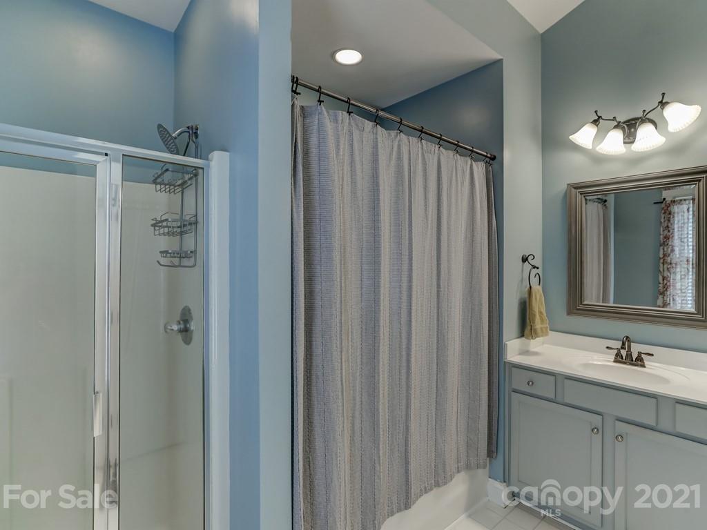 3035 Colonel Springs Way Fort Mill, SC 29708 - Photo 35 of 48 a bathroom with a double vanity sink and a mirror