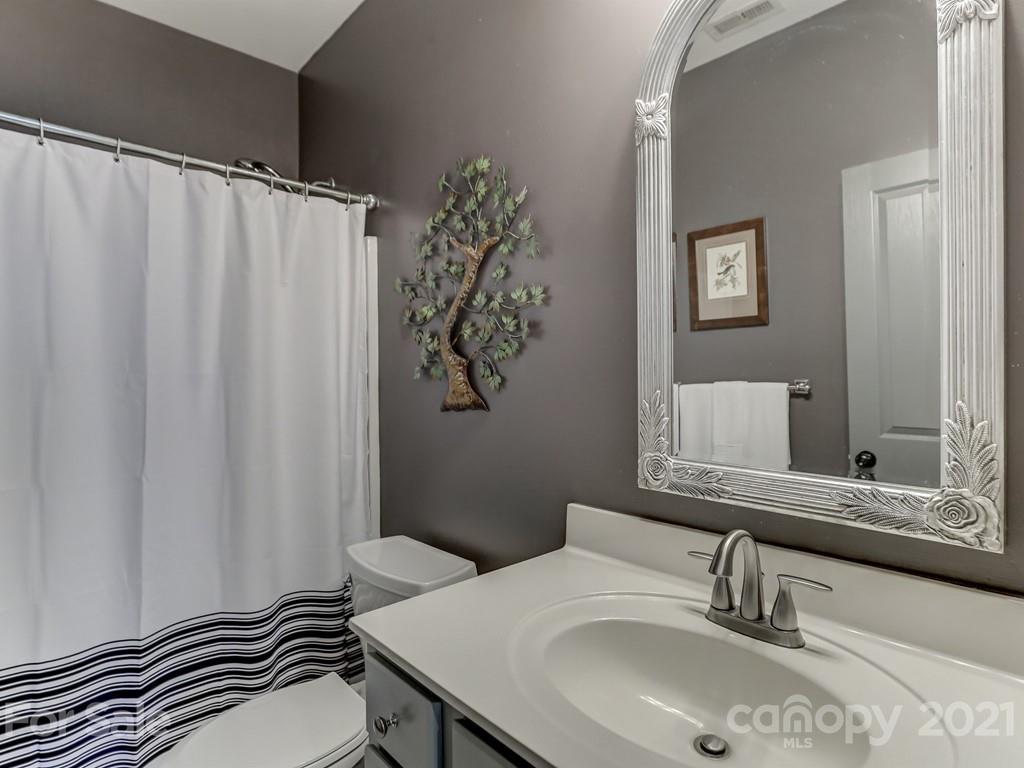 3035 Colonel Springs Way Fort Mill, SC 29708 - Photo 38 of 48 a bathroom with a sink and a mirror