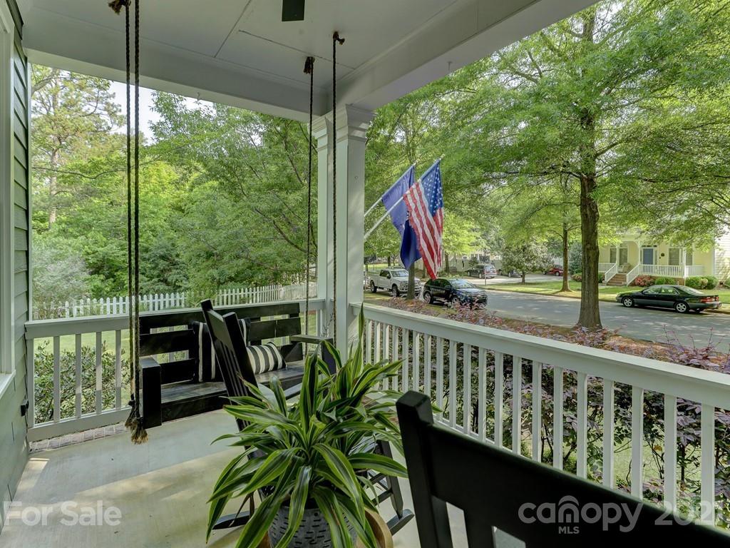 3035 Colonel Springs Way Fort Mill, SC 29708 - Photo 6 of 48 a view of a balcony with chairs and wooden floor